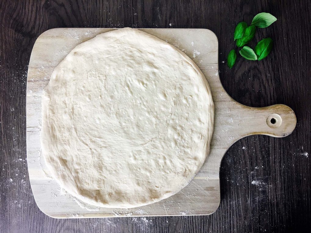 Shape a pizza with your hands